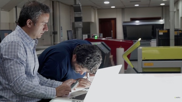 Longo employees inspecting plates